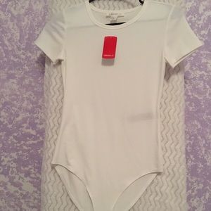 3 different style white tops